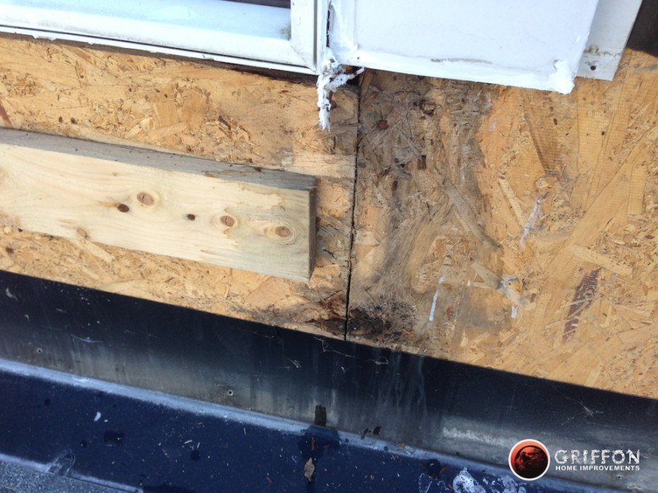 Removing old siding with old wood & plywood